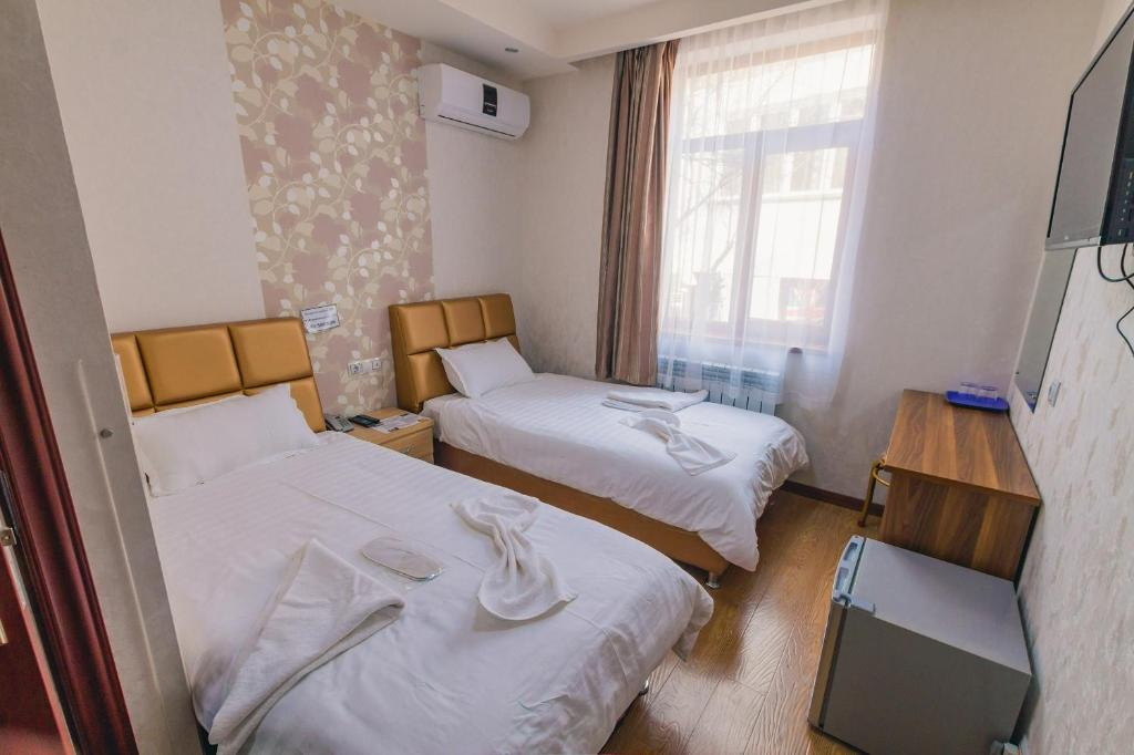 Двухместный номер Garden House с двумя отдельными кроватями
